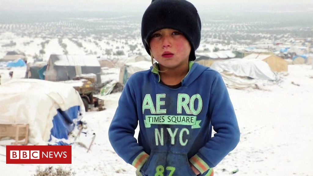 Syria war: Displaced forced to camp in freezing ...